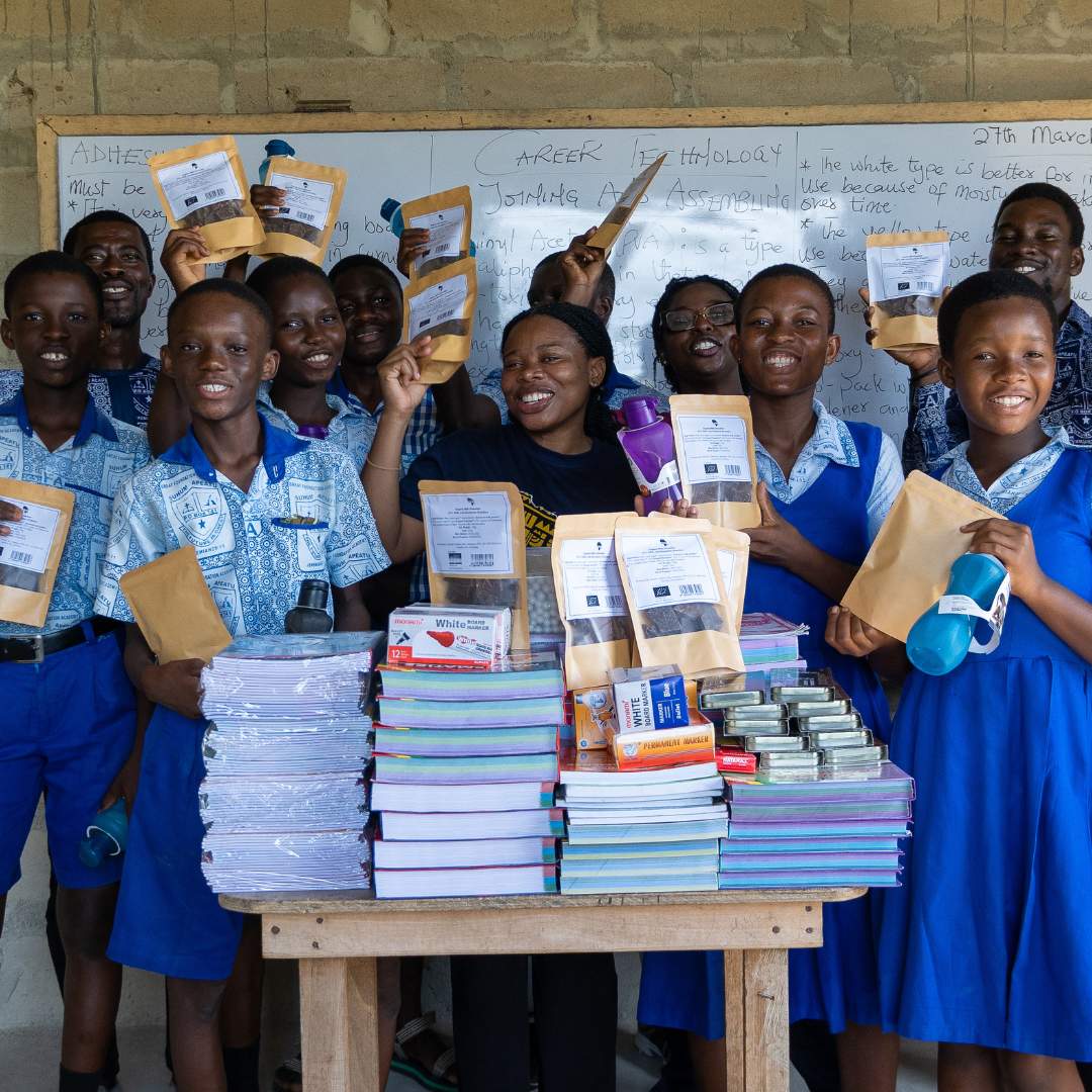 fairafric CSR team with students and donated school materials